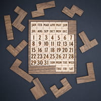 Photo of another calendar puzzle with a different board and different pieces